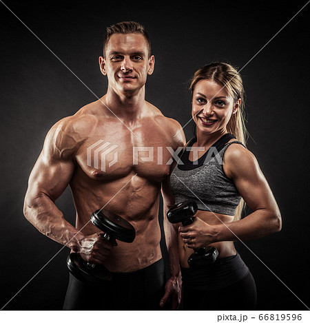 beautiful muscular fit woman exercising building muscles and fitness woman  doing exercises in the gym. Fitness - concept of healthy lifestyle 5247005  Stock Photo at Vecteezy