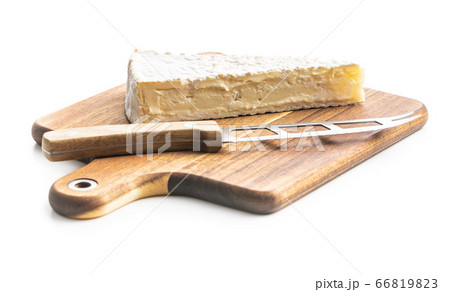 Brie cheese. White soft cheese with white mold on 66819823