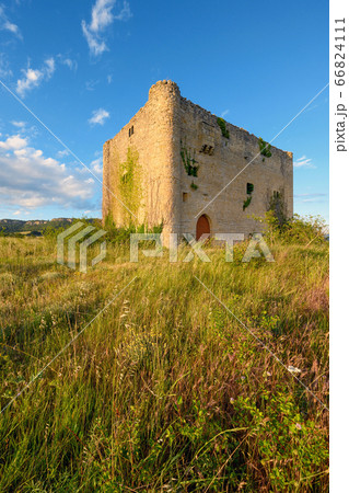 Scenic landscape of a medieval tower at sunset. Scenic landscape of a medieval tower at sunset. 66824111