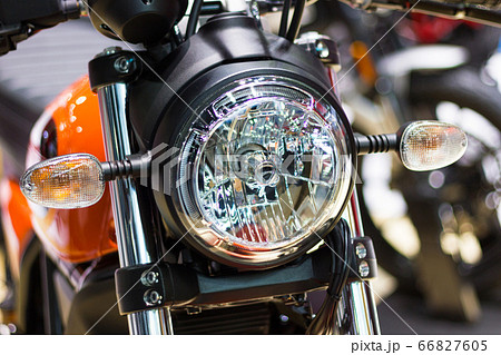 Nonthaburi Thailand:- April 6, 2017:  Closeup Detail parts of Headlight "DUCATI Scrambler" Motorcycle Ducati Monster at International Motor Show - Nonthaburi, Thailand 66827605