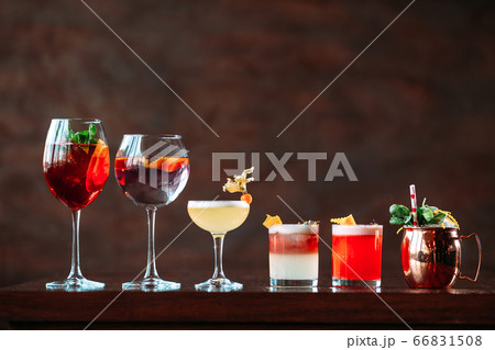 Variety of different sweet alcohol cocktails  66831508