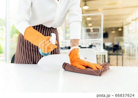Waitress cleaning table, New Normal Restaurant Waitress cleaning table, New Normal Restaurant 66837624