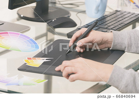 Designer using graphics tablet 66840694