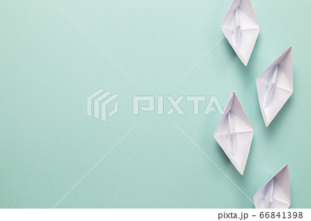 White paper ships on blue background. ships heading for the same destination. Business, success, competition, goal concept 66841398