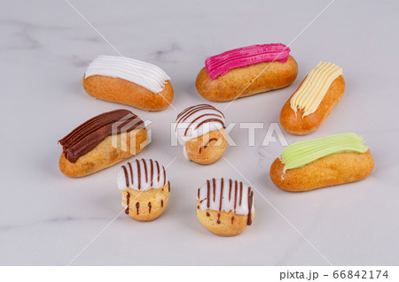 Ecklers and profitrole fruit assorted with bright fruit fillings 66842174