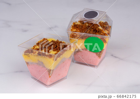 Fruit mousse of strawberries and mangoes, with the addition of mashed strawberries and mangoes Fruit mousse of strawberries and mangoes, with the addition of mashed strawberries and mangoes 66842175