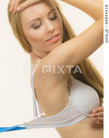 Female wearing too big bra - Stock Photo [95408563] - PIXTA