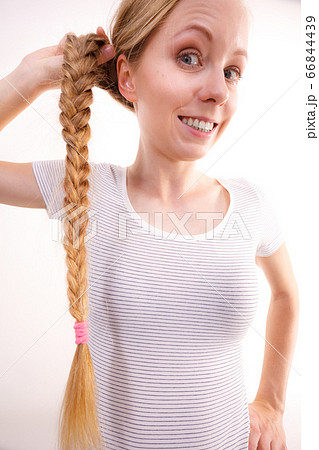 Blonde girl with braid hair 66844439
