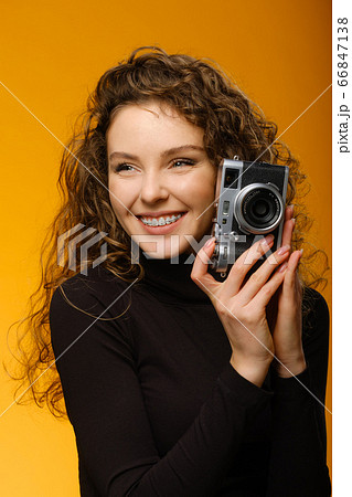 Beautiful girl with dental braces isolated on 66847138