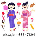 Japanese girls wearing yukata (summer kimonos) during midsummer festival. Festive food of Japan. Asian clothes and snacks. 66847894