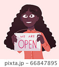 Black female small business owner or worker holding up sign for reopening of the place after end of quarantine. Reopening after covid-19	 66847895