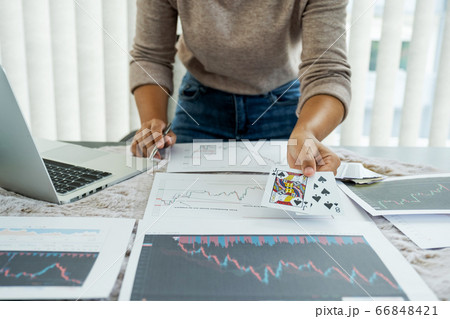 Young women sitting at a desk with a laptop, stock Young women sitting at a desk with a laptop, stock 66848421