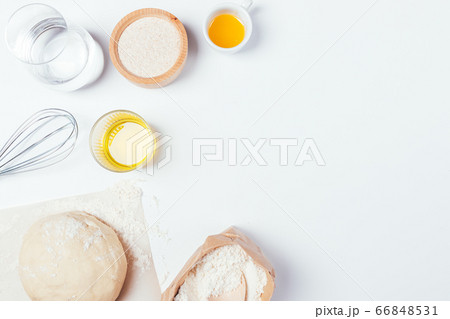 Homemade yeast dough next to whole grain flour Homemade yeast dough next to whole grain flour 66848531