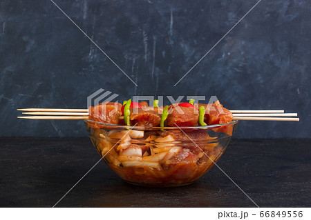 Marinated meat with onions, peppers and soy sauces 66849556