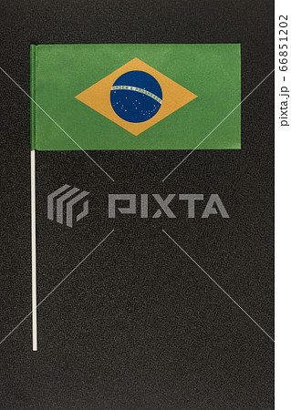 Table flag of Brazil on black background. Ordem e 66851202