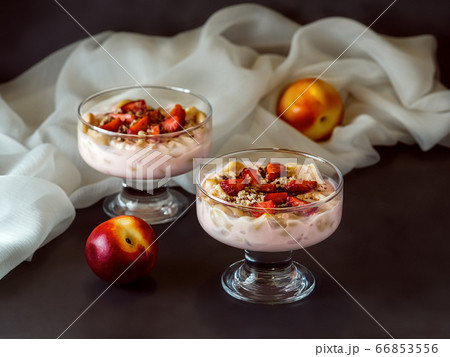 A dessert of yogurt and fruit 66853556