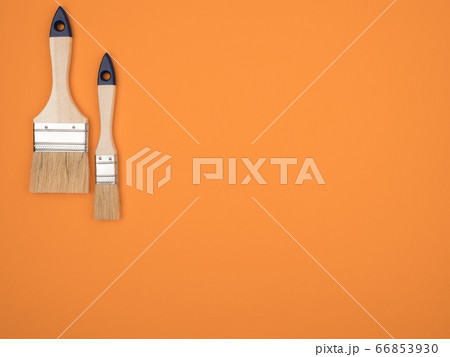 Brush set for painting works. Orange background. Brush set for painting works. Orange background. 66853930