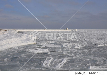 The Black Sea, ice bound in winter, under a cloudy sky. The Black Sea, ice bound in winter, under a cloudy sky. 66854986
