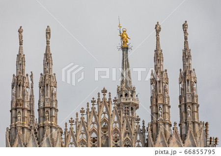 Gold Statue Duomo Milan 66855795