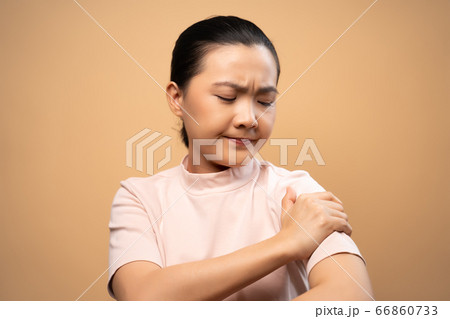 Asian woman was sick with body pain standing 66860733