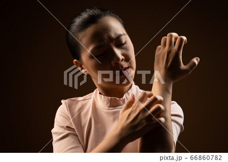 Asian woman was sick with irritate itching her Asian woman was sick with irritate itching her 66860782