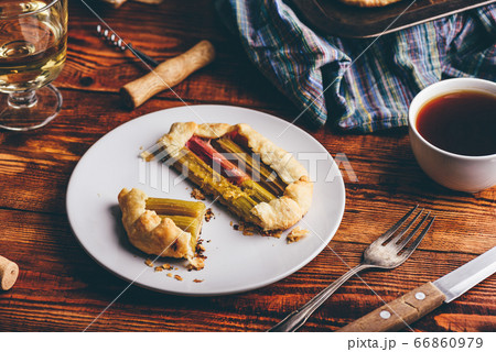 Rhubarb mini galette on white plate Rhubarb mini galette on white plate 66860979