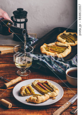 Rhubarb galette on white plate 66861007
