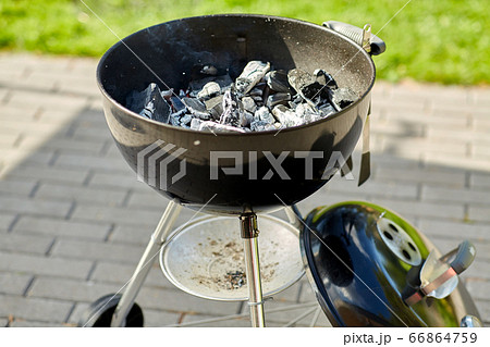 charcoal smoldering in brazier outdoors charcoal smoldering in brazier outdoors 66864759