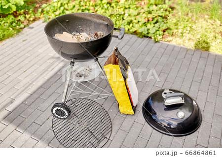 bbq grill brazier and bag of charcoal outdoors bbq grill brazier and bag of charcoal outdoors 66864861