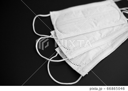 close up of white face protective medical masks close up of white face protective medical masks 66865046