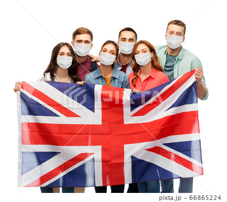 people in medical masks with british flag 66865224