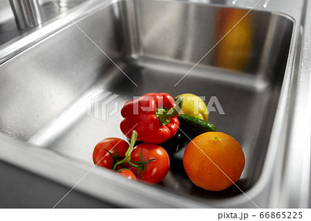 fruits and vegetables in kitchen sink fruits and vegetables in kitchen sink 66865225