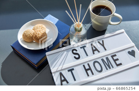 lightbox with stay at home caution words lightbox with stay at home caution words 66865254
