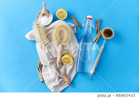 vinegar, lemons, soda, clothespins and brushes vinegar, lemons, soda, clothespins and brushes 66865435