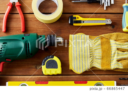 different work tools on wooden boards 66865447