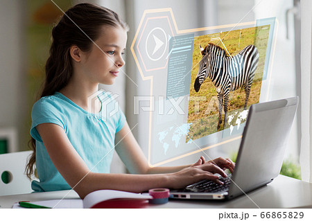 girl with laptop learning nature online at home 66865829