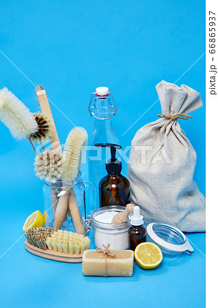 lemons, soap, washing soda, vinegar and brushes 66865937