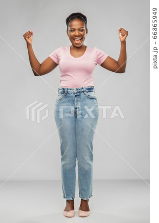 happy african american woman celebrating success happy african american woman celebrating success 66865949