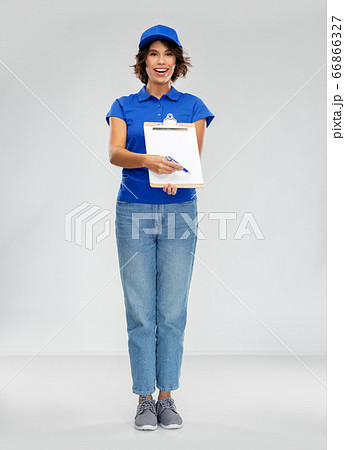 happy smiling delivery woman with clipboard 66866327