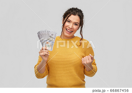 happy smiling young woman with dollar money happy smiling young woman with dollar money 66867456