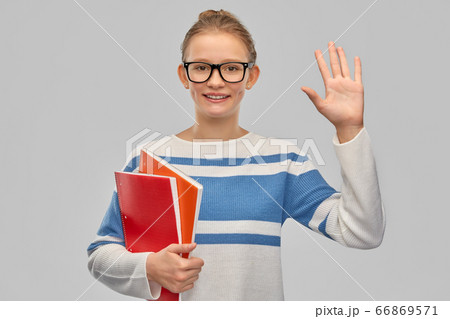 happy smiling teenage student girl with notebooks happy smiling teenage student girl with notebooks 66869571