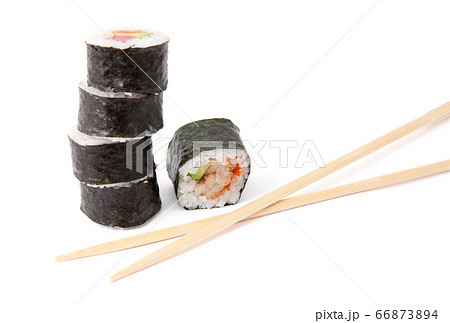 Sushi roll and chopsticks isolated on white Sushi roll and chopsticks isolated on white 66873894