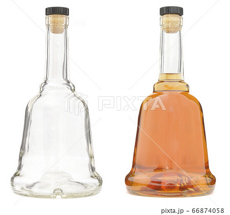 Brandy. Full and empty glass bottles Brandy. Full and empty glass bottles 66874058