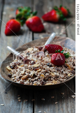 Homemade muesli with strawberry on the wooden 66874541