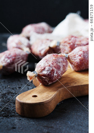 Delicious italian salami on the table Delicious italian salami on the table 66875159