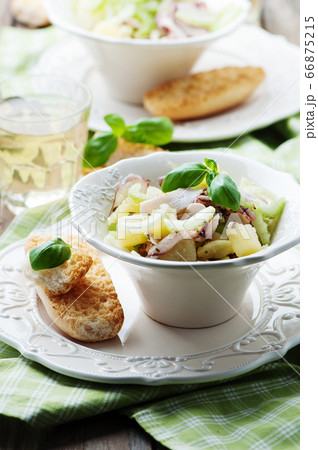 Healthy salad with octopus, celery and potato Healthy salad with octopus, celery and potato 66875215