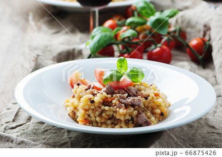 Cooked sardinain pasta fregola with tomato and Cooked sardinain pasta fregola with tomato and 66875426