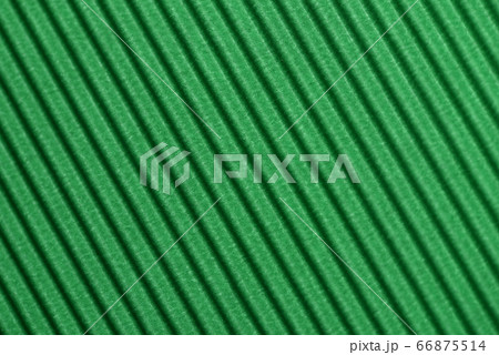 Light green colored corrugated cardboard texture 66875514