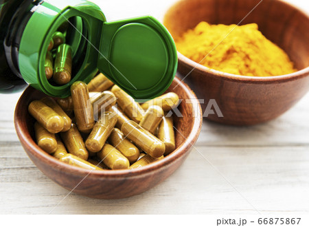 Turmeric powder and capsules 66875867