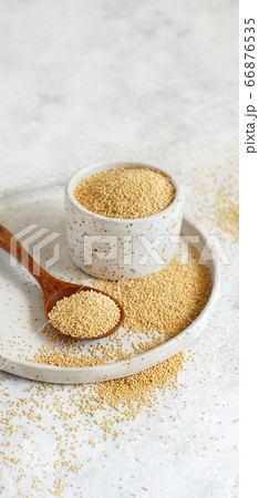Bowl of Raw Amaranth Grain with a spoon Bowl of Raw Amaranth Grain with a spoon 66876535